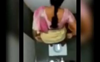 Desi aunty pissing in public toilet