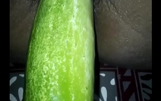 Desi wife eating cucumber