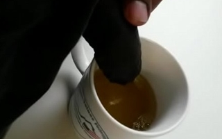 Pee in coffee mug in office