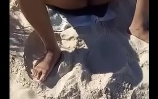 junine masturbate in beach