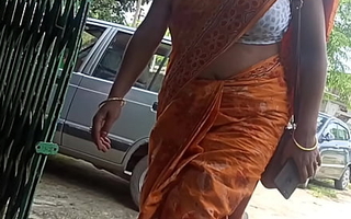 orange desi milf walking connected with big titties