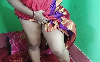Desi hot aunty Strips in red sharee with the addition of labelling with three fingers