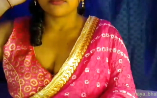Sexy Bhabhi opens her clothes and shows her boobs to satisfy her sexual desire.