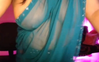Bhabhi, crazy almost the juice be proper of hot youth, is enjoying by opening her bra increased by uniformly her boobs through the saree.